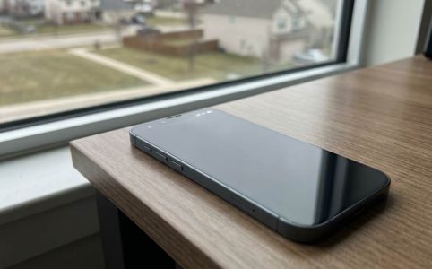 Person checking 5G upload speed on smartphone with signal bars visible